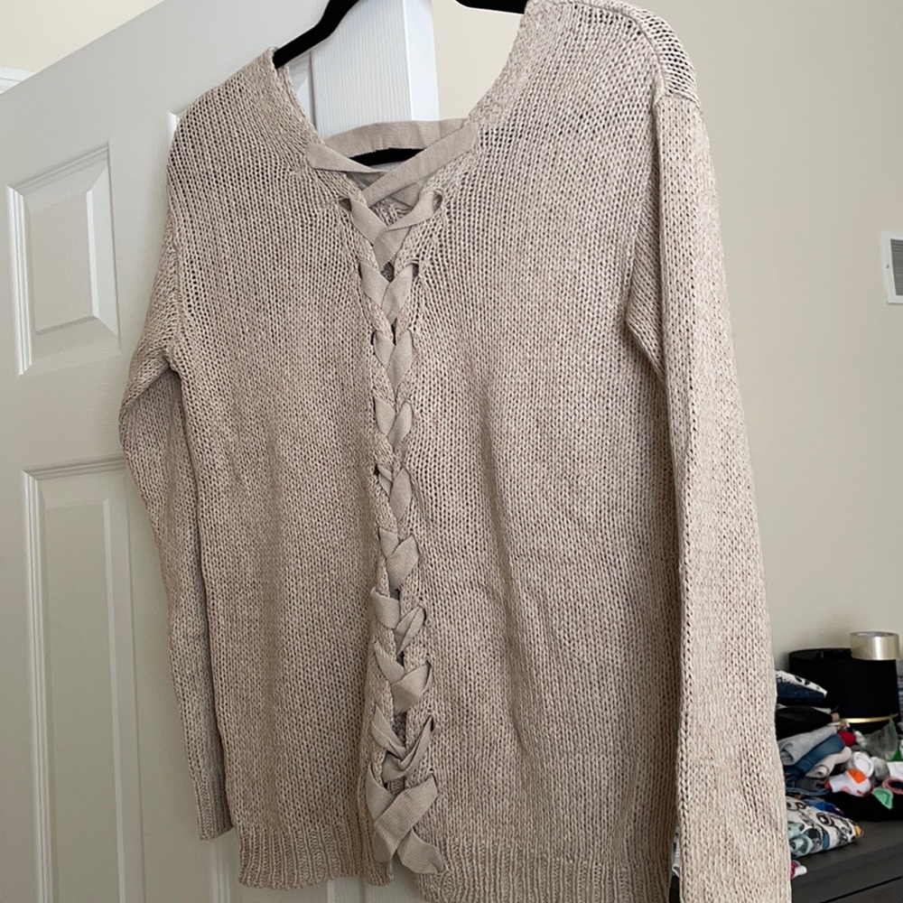 Sweater with tied up back